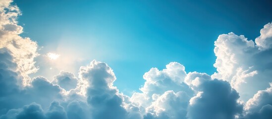 Bright sky with fluffy clouds © indirah