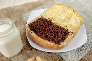 Bread with chocolate choco rice and butter with milk and snack for breakfast	
