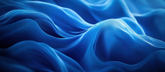 Obraz premium Abstract Blue Silk Fabric Waves Background