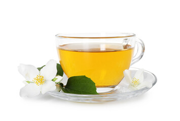 Aromatic jasmine tea in glass cup, flowers and green leaves isolated on white