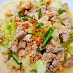 Delectable Stir-Fry: A vibrant overhead shot showcasing a plate of savory stir-fry with a symphony of textures and flavors, featuring perfectly cooked meat and fresh vegetables.