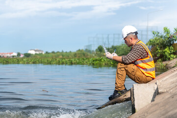 Water resources officers are checking for contaminants in a swamp