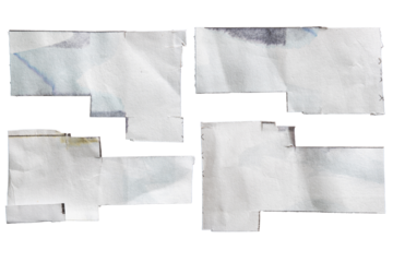 Ink stained white paper cut into abstract geometric shapes for using as textbox background