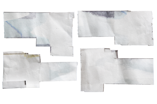 Ink stained white paper cut into abstract geometric shapes for using as textbox background
