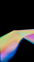 a colorful wave of light on a black background