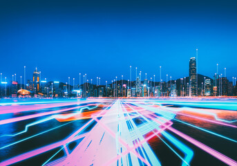 Future tech Hong Kong building city and digital cyber internet line on blue night sky background in Victoria Harbour Smart global network and Connect technology concept