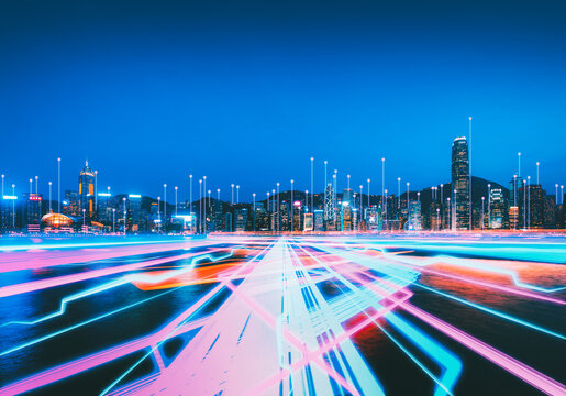 Future tech Hong Kong building city and digital cyber internet line on blue night sky background in Victoria Harbour Smart global network and Connect technology concept