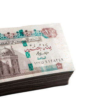 Close up macro shot of a stack of 100 Egyptian pound bills