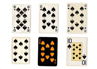 A vintage playing card in different designs isolated on a white background.