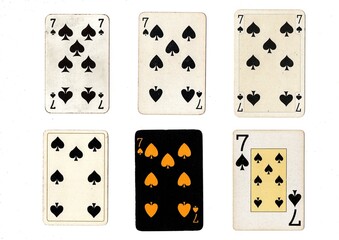 A vintage playing card in different designs isolated on a white background.