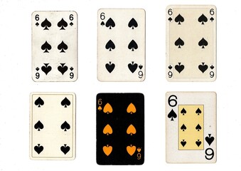 A vintage playing card in different designs isolated on a white background.