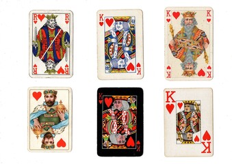 A vintage playing card in different designs isolated on a white background.