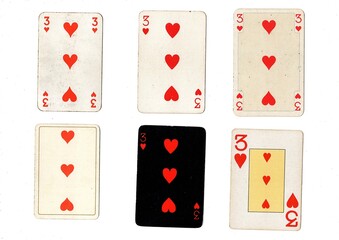 A vintage playing card in different designs isolated on a white background.