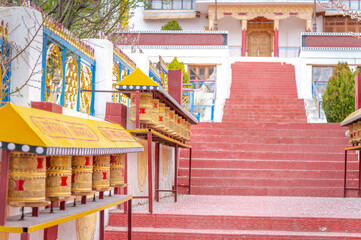 Fototapeta premium Samstanling Monastery with prayer wheels and stone stairs in Nubra Valley, Ladakh, India