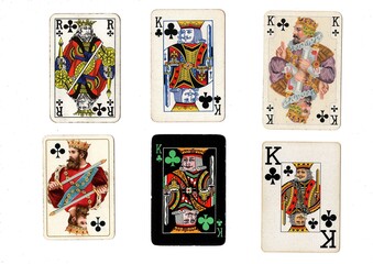 A vintage playing card in different designs isolated on a white background.