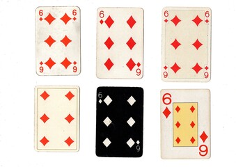 A vintage playing card in different designs isolated on a white background.