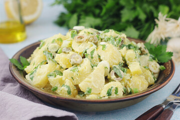 A bowl with Greek potato salads