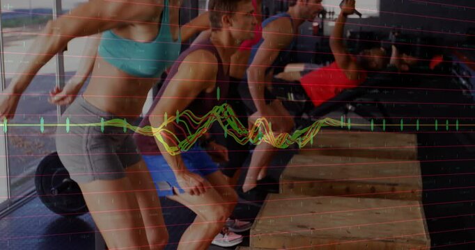 Gym group responding on beep, performing box jumps and bench pressing with waveform tracking power
