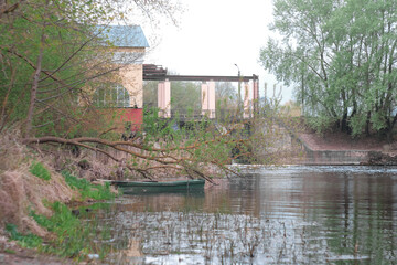 Dam of small hydroelectric power station, water discharge through locks
