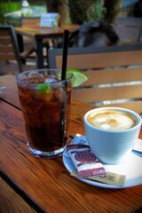 Relaxing in a restaurant - refreshing beverages - cuba libre and cafe latte