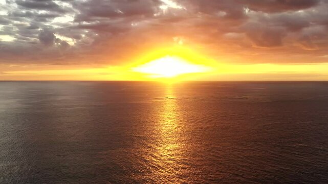 Setting sun to secluded Fiji island in Pacific ocean popular tourism resort destination.
