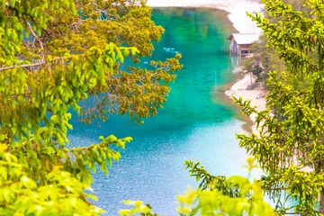 Gordijnen Blindsee lake turquoise water at Zugspitze mountain alpine landscape Austria. © arkadijschell
