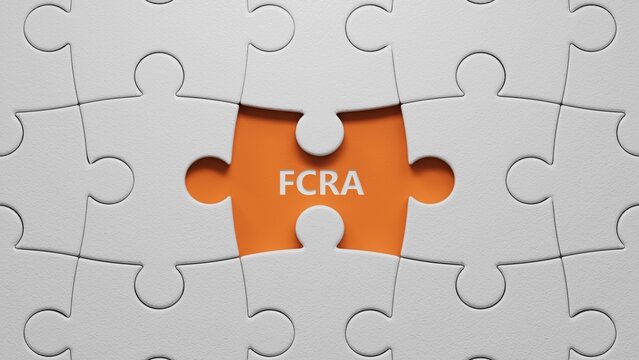 FCRA was created from The white puzzle pieces with missing pieces. Finance and Banking.close up of The white puzzle pieces with missing pieces,Business Concept.3D rendering on orange background.