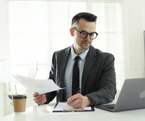 Marketing. Man working at desk in office