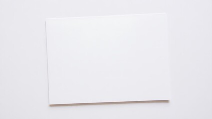 Fototapeta premium Blank white paper sheet on white background mockup