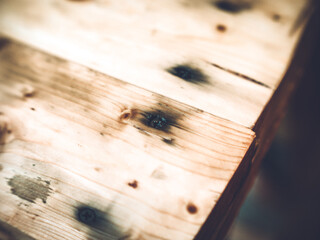 the black self-tapping screw is screwed into the wood