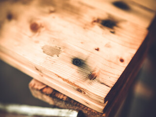 the black self-tapping screw is screwed into the wood