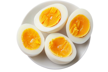 Nutritious Eggs: Close-up image featuring cut boiled eggs arranged on a plate, showcasing the golden yolks and the simplicity of a wholesome meal.