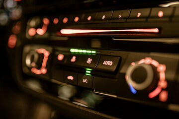 Modern car dashboard displaying climate control settings