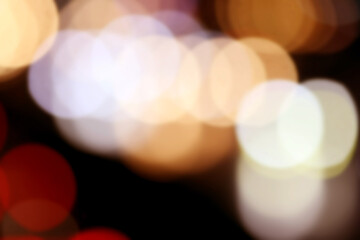 Abstract Bokeh of Urban Lights: A mesmerizing array of soft, blurred light circles floats in a dark background, evoking a sense of mystery and allure in this abstract photographic artwork.