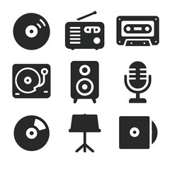Vintage Music Icons. Solid, filled icons set of vintage music and media: vinyl record, retro radio, classic cassette, record player, antique speaker, vintage mic, CD, music stand, secondhand album.
