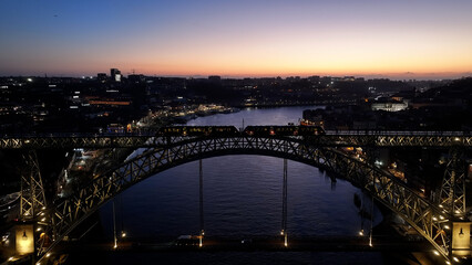 Sunset Luis I Bridge At Porto In Porto District Portugal. Sunset City Scene. Illuminated Bridge...