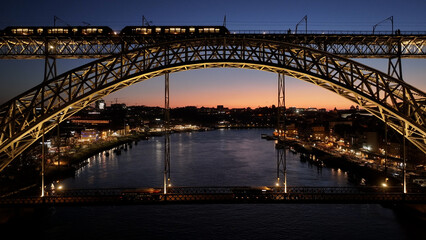 Sunset Dom Luis I Bridge At Porto In District Of Porto Portugal. Sunset Skyline Scene. Illuminated...