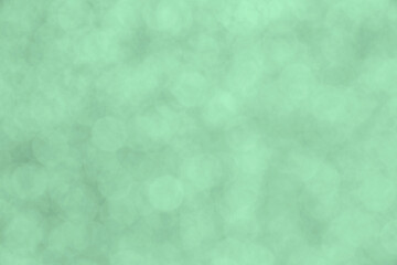 close up of light green bokeh circles background