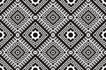 A bold black and white seamless pattern inspired by traditional geometric and ethnic motifs. Featuring sharp diamond shapes, spiral elements, and symmetrical pixel details, this design is ideal for in