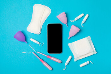 Menstrual cup on a bright background. Sanitary napkins, tampons and menstrual cup.Concept of...