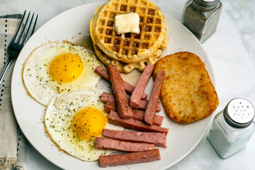 fried  eggs with waffles and spam  sticks