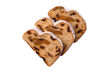 Christmas Stollen, a German sweet cake with marzipan and fruit. Winter Christmas Stollen