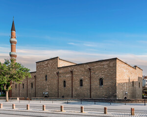 Iplikci Mosque, an important landmark in Konya, Turkey, features stunning ancient architecture and a tall red brick minaret