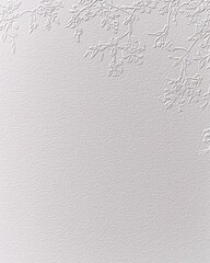 Minimalistic embossed floral details on a vertical white textured background.