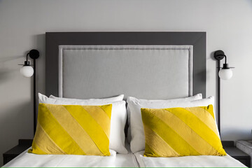 Modern luxury bedroom interior in minimal scandinavian style, yellow color