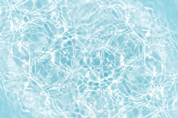Blue water with ripples on the surface. Defocus blurred transparent blue colored clear calm water...