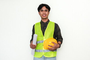 Portrait of a smiling, confident young Asian engineer standing against an isolated background. Ideal for advertisement and professional themes