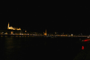Danube embankment at the evening and night. Autumn in Budapest. Old architecture. High resolution...