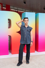 Portrait of confident non binary gay man during pride outdoors