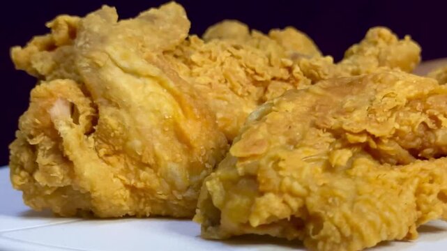 Delicious chicken broasted on dark background closeup shots 4K  quality 